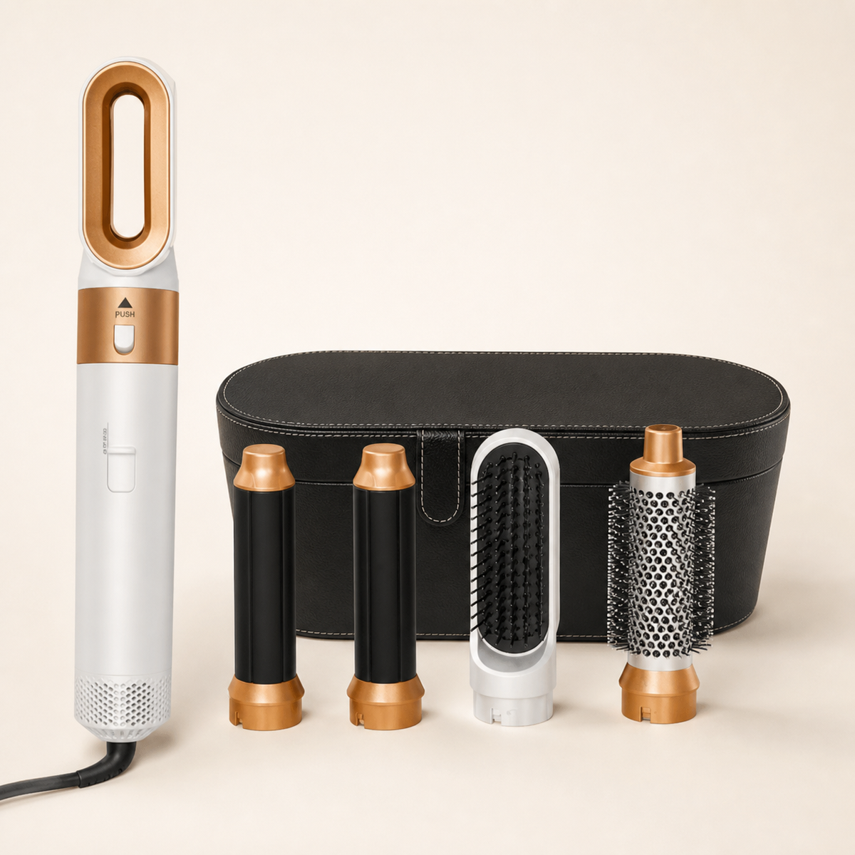 Gold Set 2 hot air styler with black case on warm ivory background