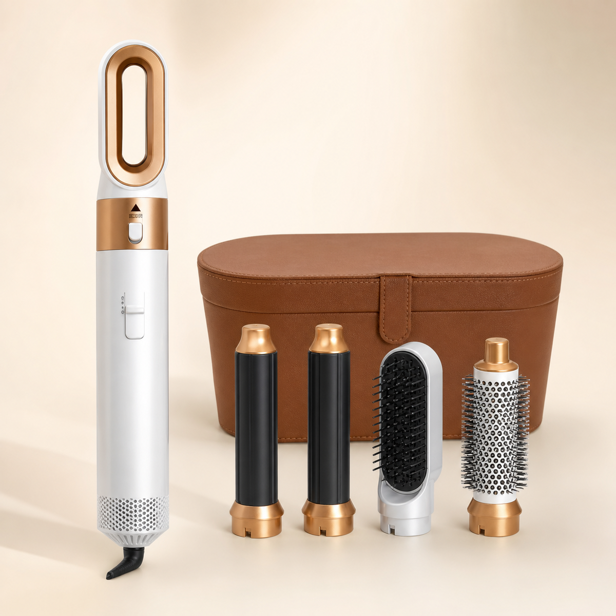 Gold White hot air styler with brown case on warm ivory background